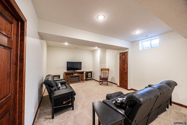 living area featuring baseboards, light carpet, visible vents, and recessed lighting