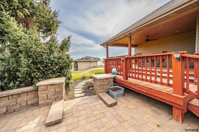 view of patio / terrace with a wooden deck and ceiling fan