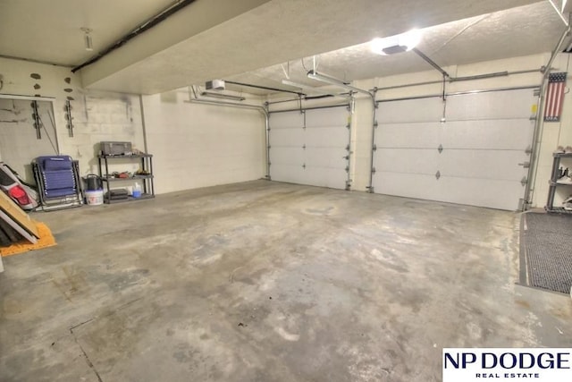 garage featuring a garage door opener