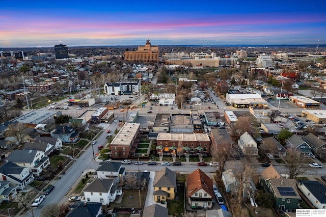 aerial view at dusk with a city view