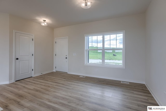 11014 N 161st St, Bennington, NE 68007 - interior space featuring baseboards and wood finished floors