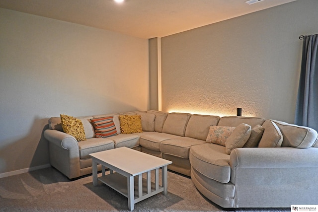living room with carpet floors and baseboards