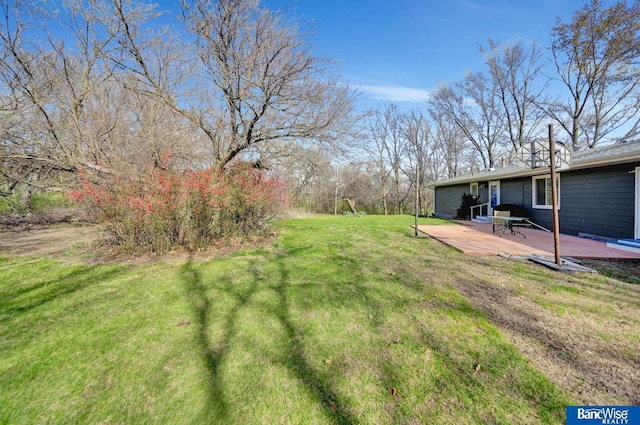 view of yard featuring a deck