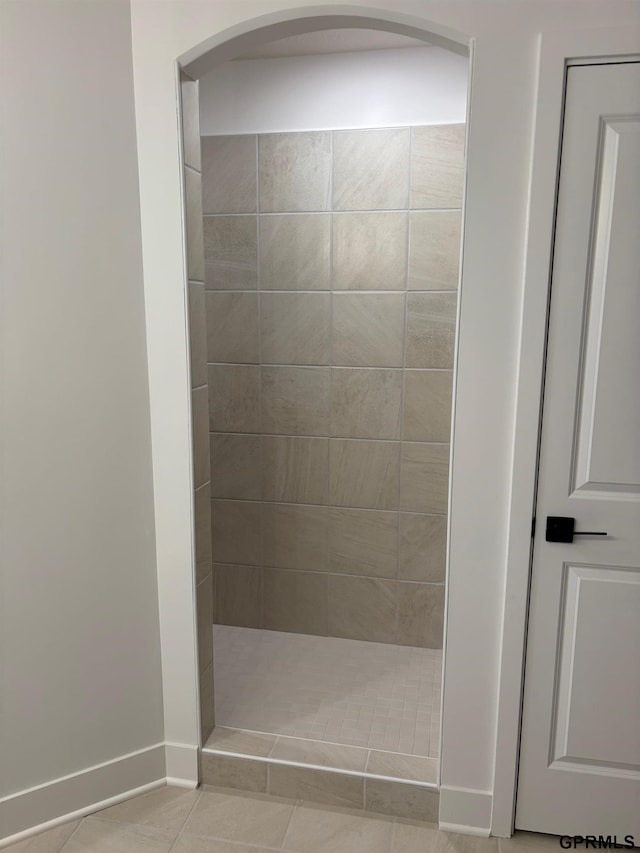 5412 N 190th Ave, Elkhorn, NE 68022 - bathroom featuring a walk in shower, baseboards, and tile patterned floors