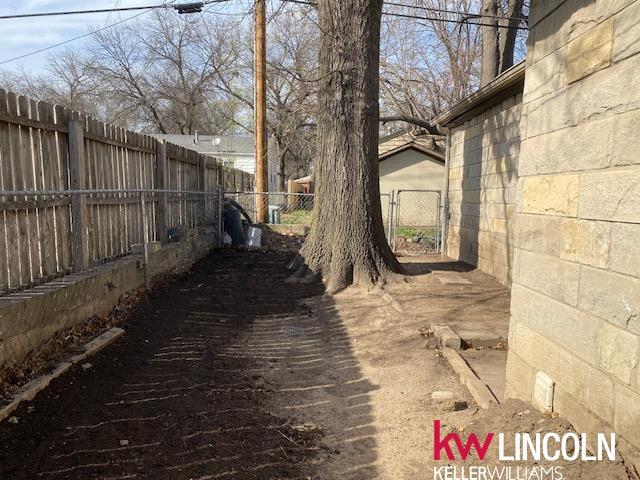 exterior space featuring a fenced backyard