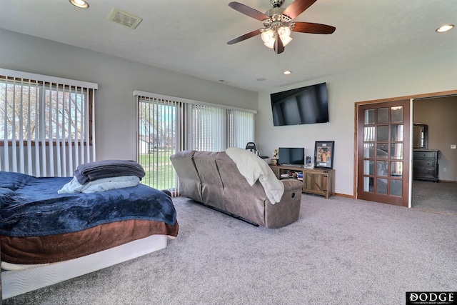 carpeted bedroom featuring access to outside, baseboards, recessed lighting, a ceiling fan, and visible vents