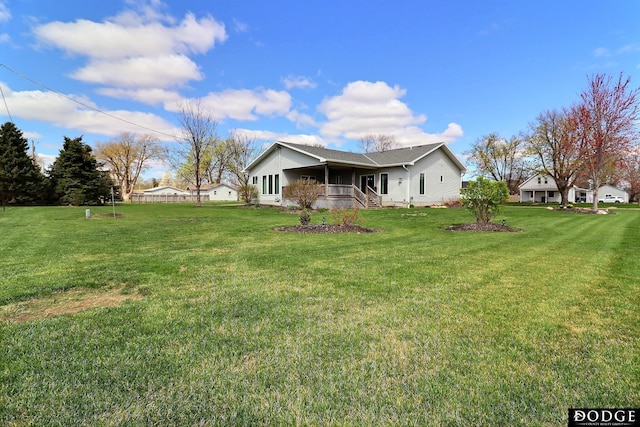 view of home's exterior featuring a yard
