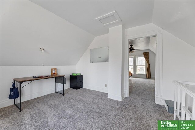 bonus room featuring attic access, baseboards, vaulted ceiling, and carpet floors