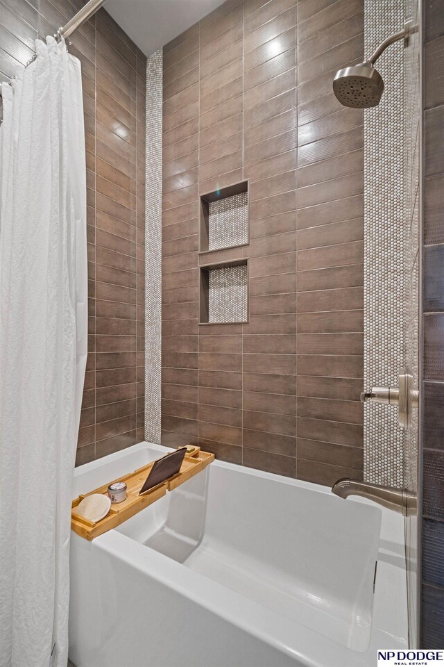 full bathroom with shower / tub combo with curtain