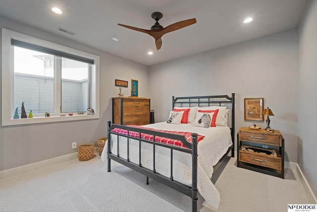 bedroom with carpet floors, baseboards, recessed lighting, and visible vents