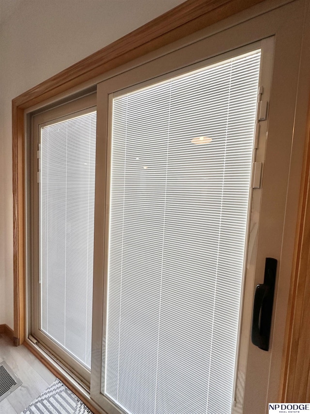 entryway featuring visible vents