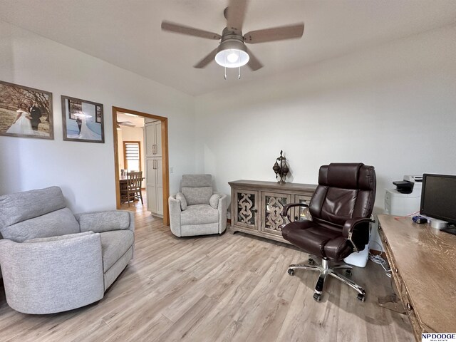office area featuring light wood-style floors and a ceiling fan