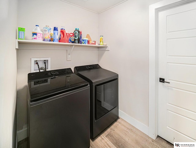 11731 N 144th St, Waverly, NE 68462 - laundry area featuring separate washer and dryer, light wood-style flooring, and baseboards