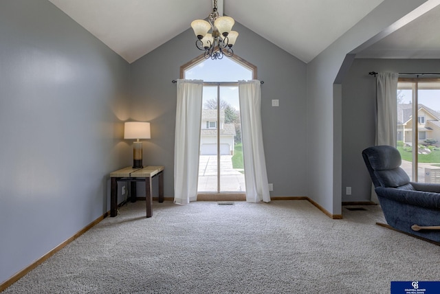 sitting room with an inviting chandelier, arched walkways, carpet, and lofted ceiling