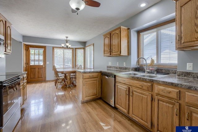 kitchen with range with electric stovetop, light wood-type flooring, dishwasher, a sink, and a peninsula