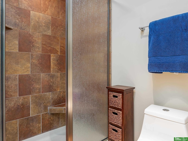 210 S 16th St Unit 901, Omaha, NE 68102 - full bath with a shower with shower door and toilet