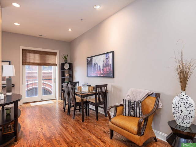 210 S 16th St Unit 901, Omaha, NE 68102 - dining space featuring wood finished floors, recessed lighting, and baseboards