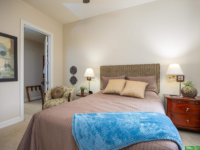 210 S 16th St Unit 901, Omaha, NE 68102 - bedroom featuring carpet floors, baseboards, and a ceiling fan