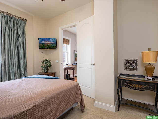 210 S 16th St Unit 901, Omaha, NE 68102 - bedroom with light carpet and baseboards