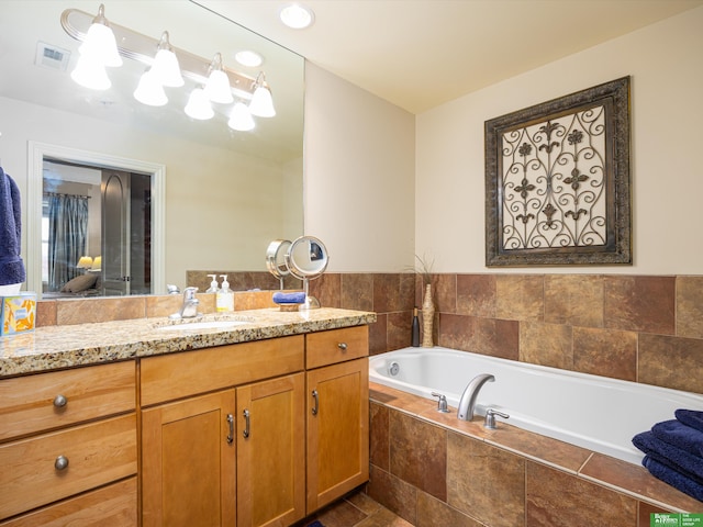 210 S 16th St Unit 901, Omaha, NE 68102 - full bath featuring a garden tub and vanity