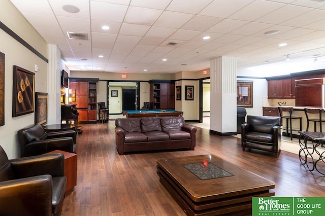 210 S 16th St Unit 901, Omaha, NE 68102 - living area with wood-type flooring, pool table, and decorative columns