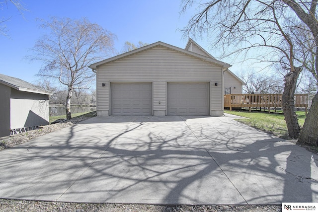 garage featuring driveway