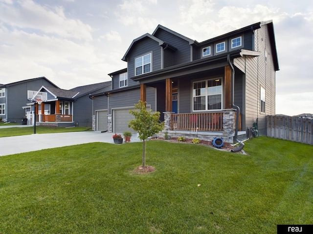 craftsman-style home featuring a porch, stone siding, fence, a front lawn, and concrete driveway