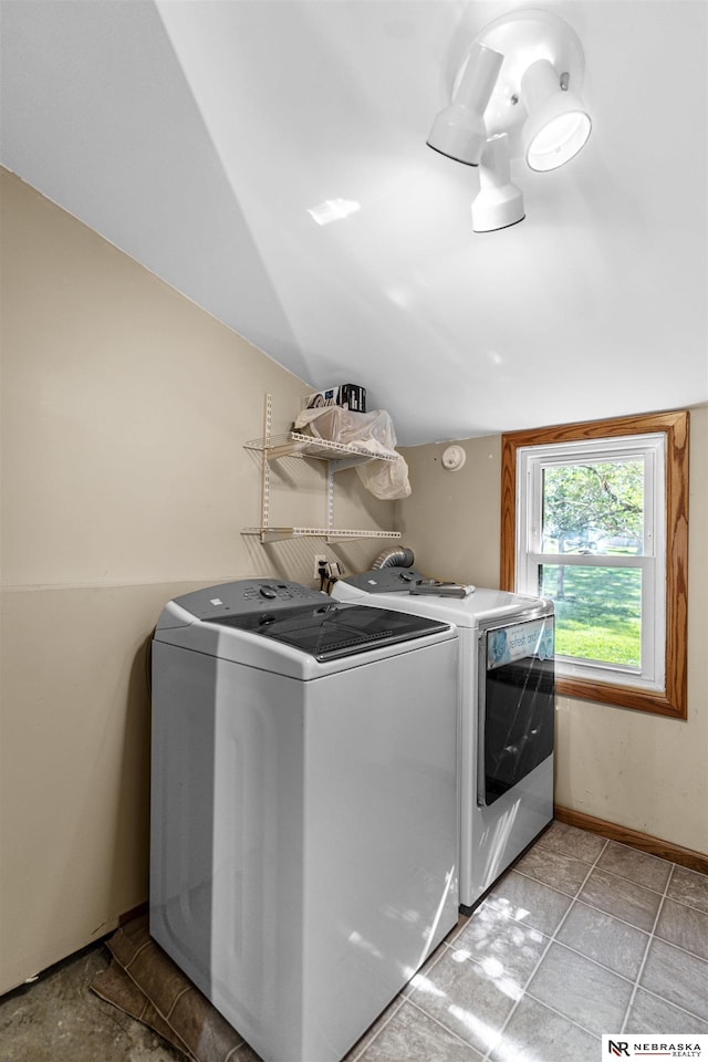 laundry area with washer and clothes dryer