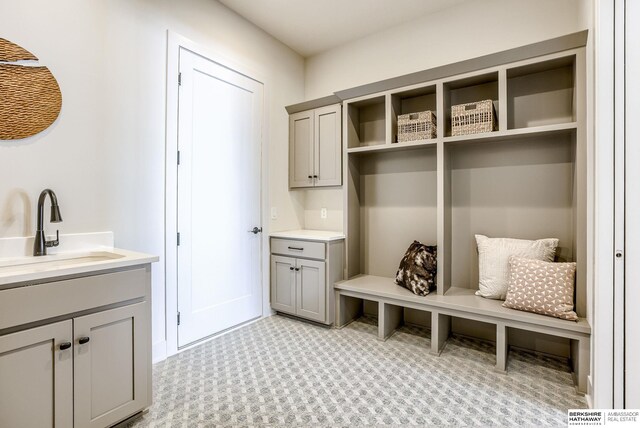 6511 Garvin St, Omaha, NE 68152 - mudroom with a sink