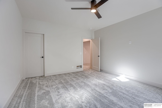 6511 Garvin St, Omaha, NE 68152 - unfurnished bedroom featuring carpet flooring, baseboards, a ceiling fan, and visible vents