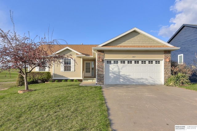 2857 Ravae Ln, Blair, NE 68008 - single story home featuring a front lawn, stone siding, a garage, and concrete driveway