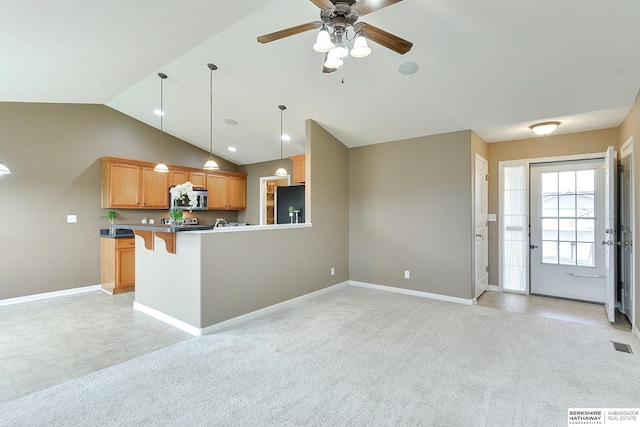 2857 Ravae Ln, Blair, NE 68008 - kitchen featuring visible vents, baseboards, ceiling fan, freestanding refrigerator, and stainless steel microwave