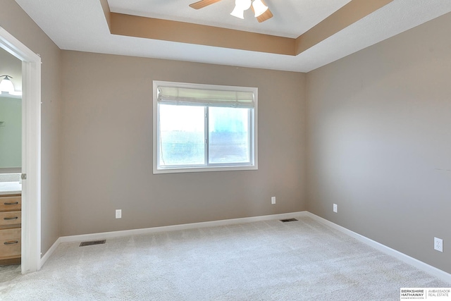 2857 Ravae Ln, Blair, NE 68008 - unfurnished room with visible vents, light colored carpet, and a ceiling fan