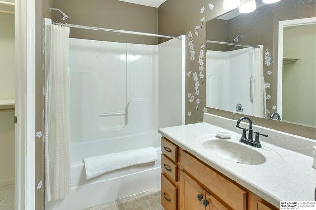 2857 Ravae Ln, Blair, NE 68008 - bathroom with vanity and shower / tub combo with curtain