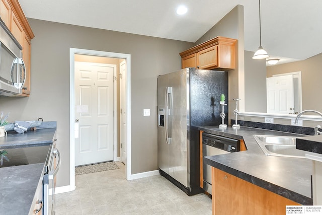2857 Ravae Ln, Blair, NE 68008 - kitchen with appliances with stainless steel finishes, a sink, baseboards, and dark countertops