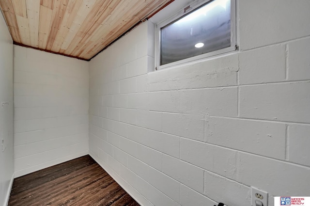 interior space featuring wooden ceiling and wood finished floors