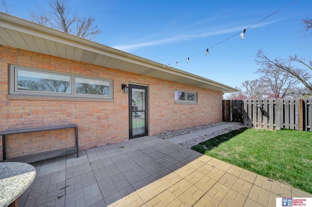 view of patio with fence