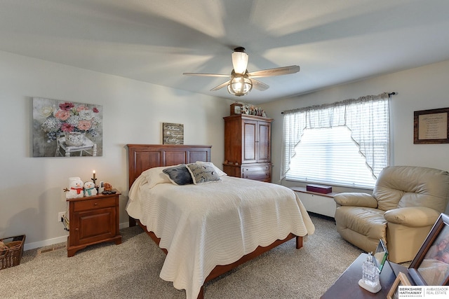 bedroom with light colored carpet, baseboards, a ceiling fan, and visible vents