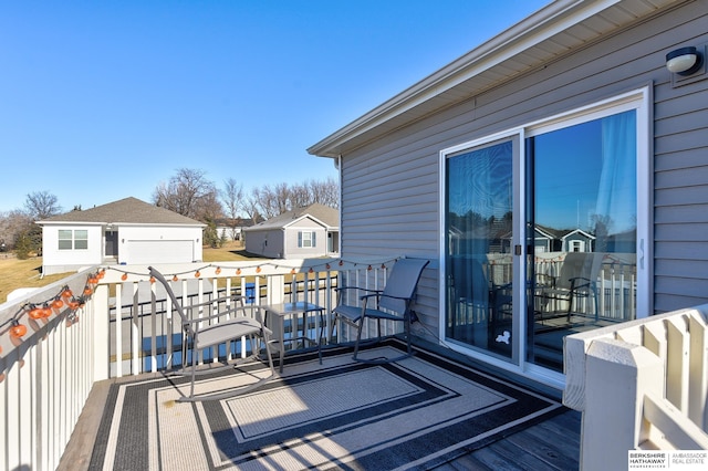 view of wooden balcony with a deck