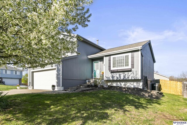 view of front of house featuring a garage and concrete driveway