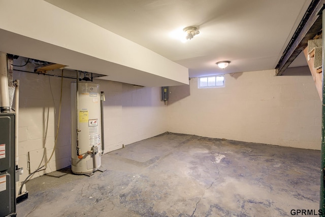 basement with gas water heater and electric panel