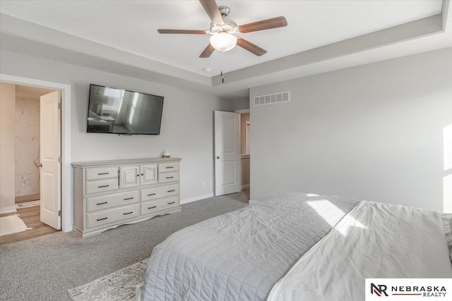 bedroom featuring light colored carpet, baseboards, and visible vents