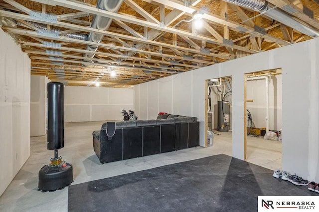 unfinished basement featuring water heater