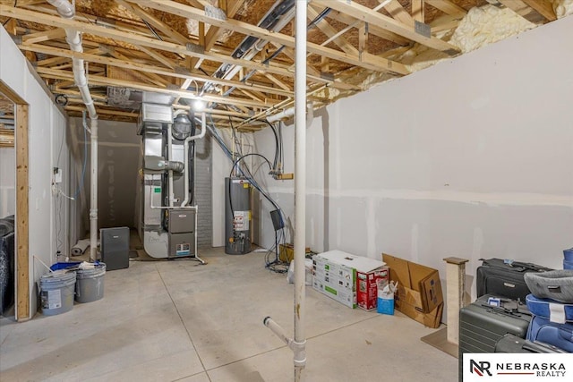 unfinished basement with heating unit and gas water heater