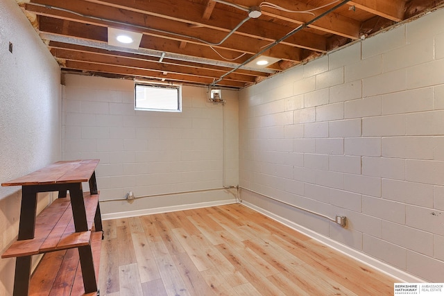 below grade area featuring light wood-style floors