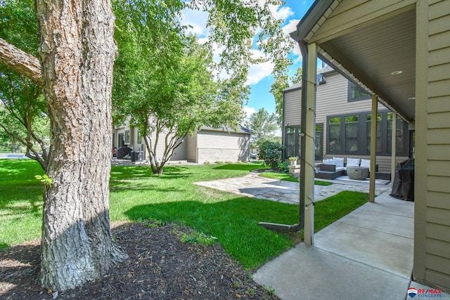 view of yard with a patio area and an outdoor hangout area