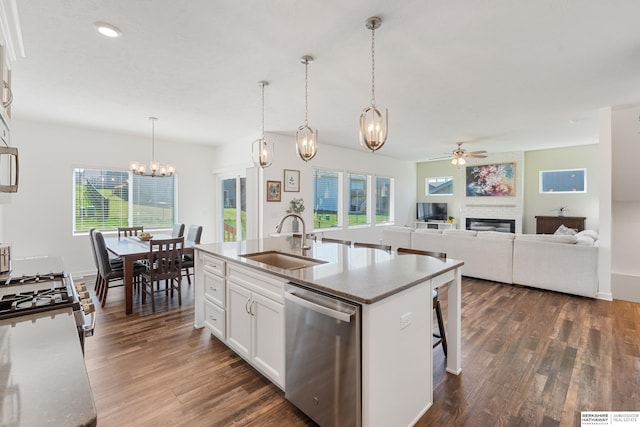 6315 N Hws Cleveland Blvd, Omaha, NE 68116 - kitchen with dishwasher, dark wood finished floors, a sink, and ceiling fan with notable chandelier