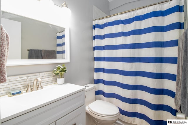 full bath featuring backsplash, toilet, vanity, and curtained shower