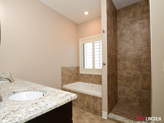 full bathroom with vanity, tile patterned flooring, a tile shower, and a bath