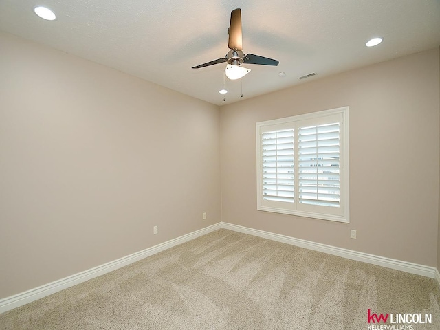 unfurnished room featuring visible vents, baseboards, ceiling fan, recessed lighting, and carpet flooring